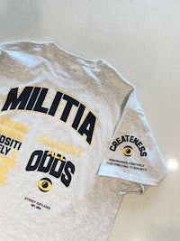 miltia against the odus t-shirt