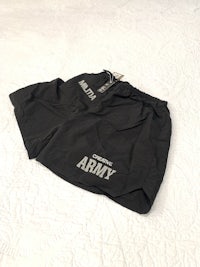 a black short with the word army on it
