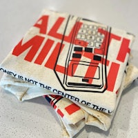 a piece of cloth with a cell phone on it